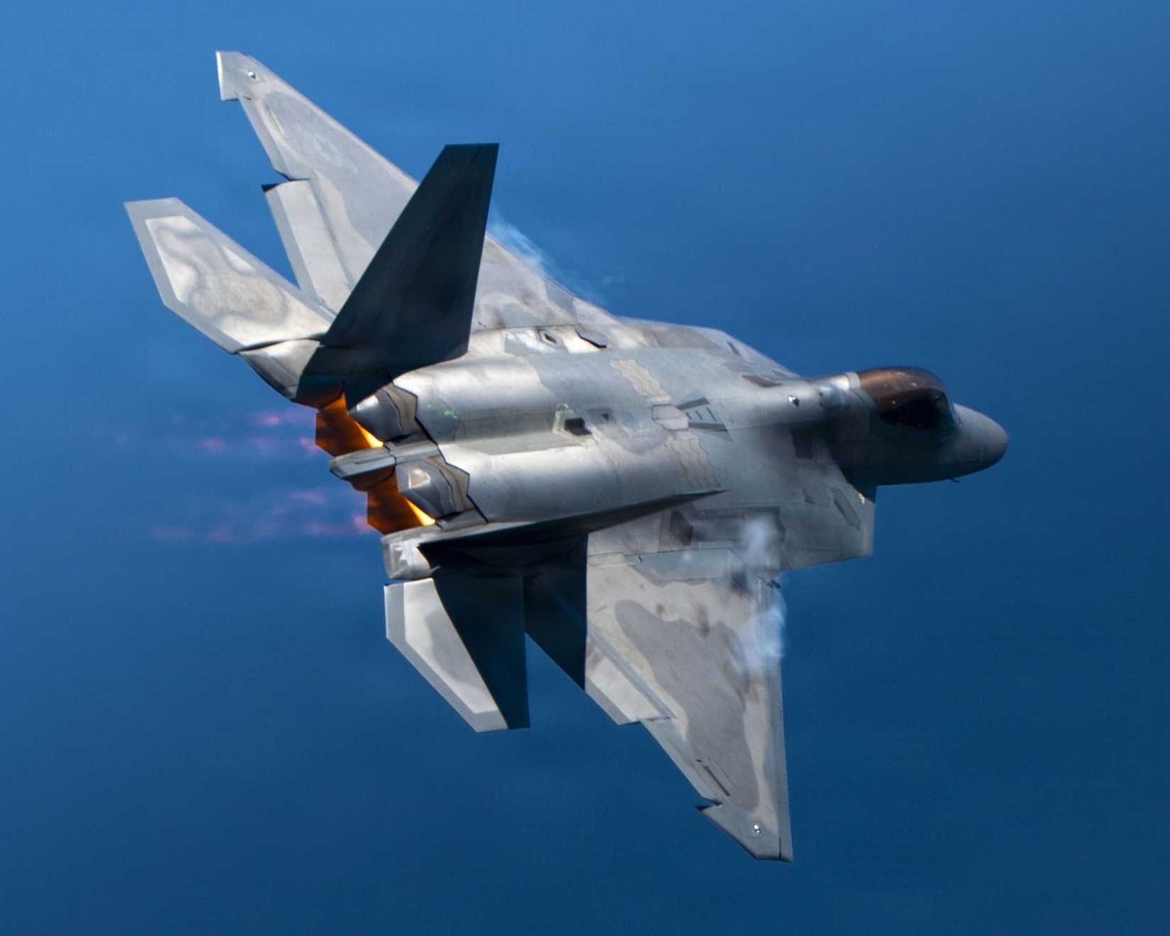 Capt. Nick ‘Laz’ Le Tourneau, F-22 Raptor Demonstration Team commander and pilot, releases flares during an aerial demonstration at the 2026 Pacific Airshow in Huntington Beach, California, Oct. 3, 2026.