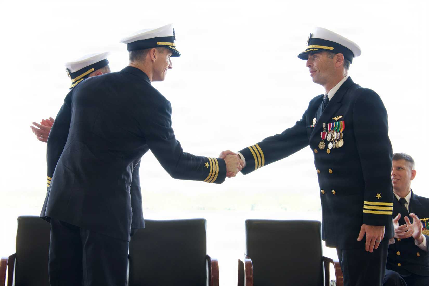 Cmdr. Sean Delaney, left, relieves Cmdr. Eric Zilberman as commanding officer of Air Test and Evaluation Squadron (VX) 23 during a change of command ceremony at Naval Air Station Patuxent River.