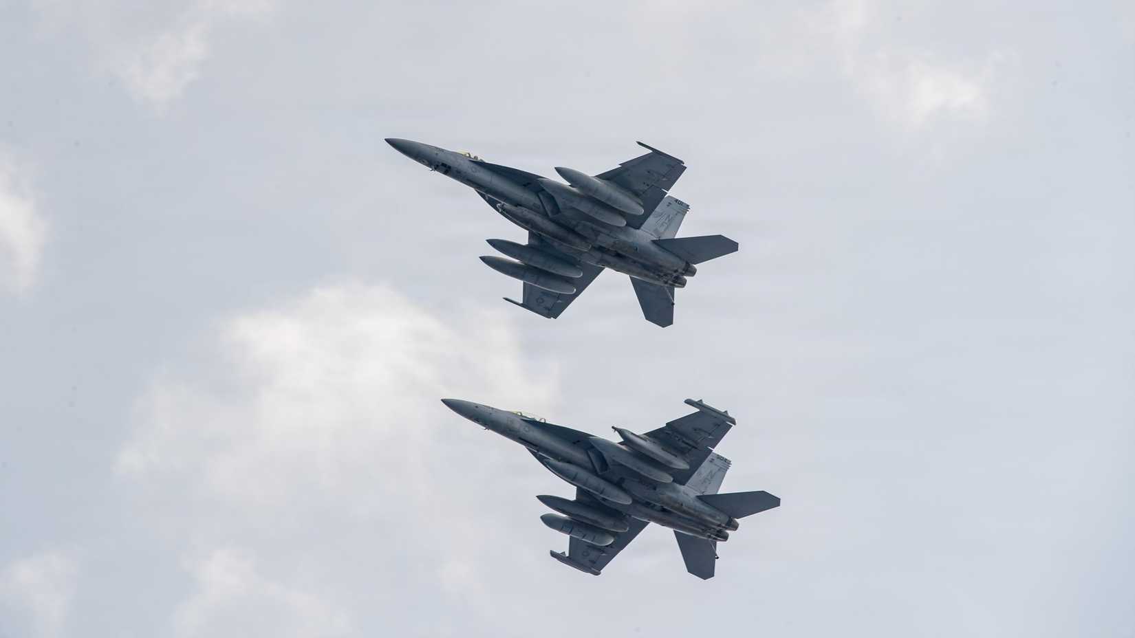 F-18, attached to Strike Fighter Squadron (VFA) 195, and an EA-18G Growler,