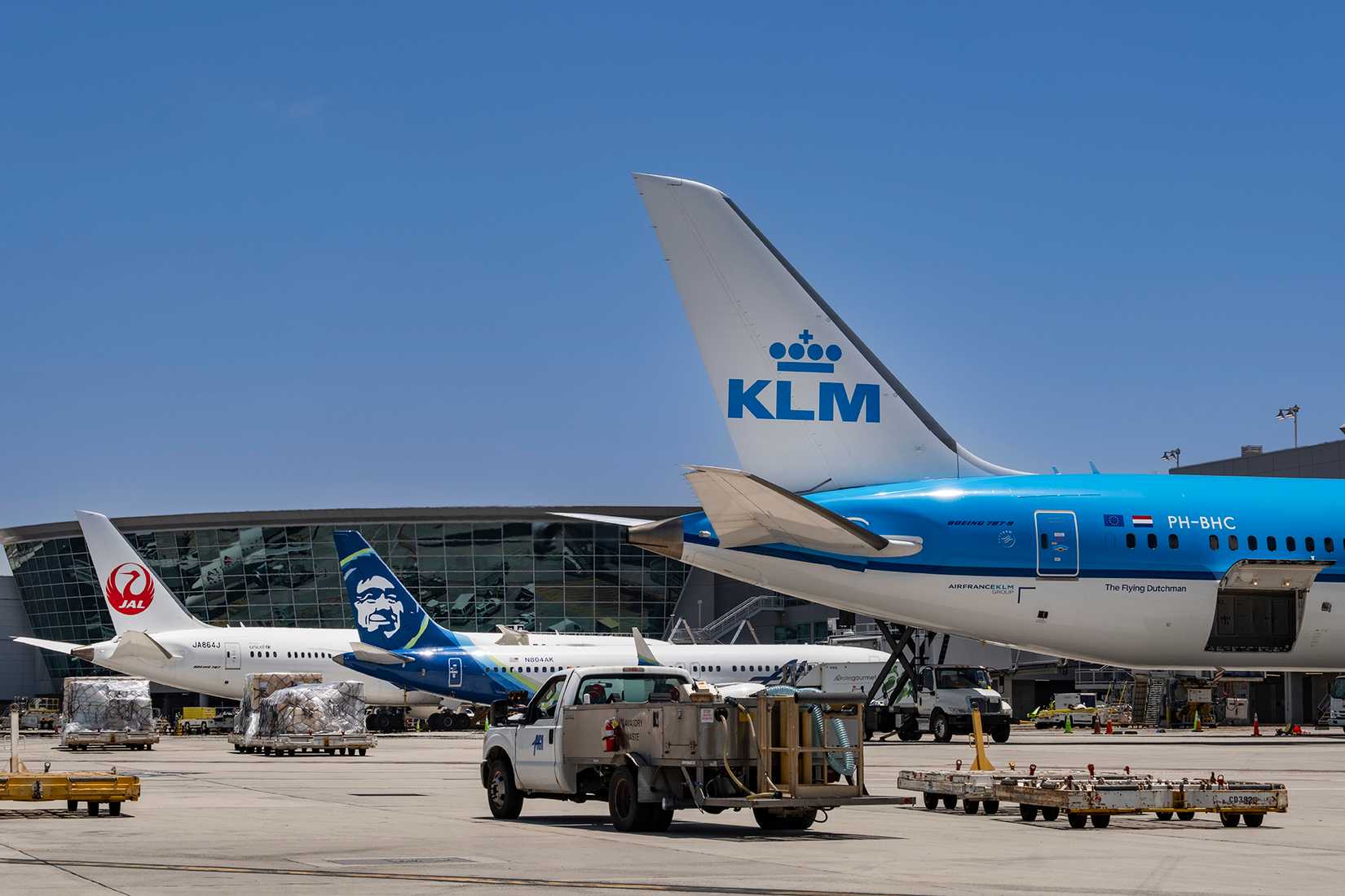 International airlines at the gate in SAN alongside Alaska Airlines