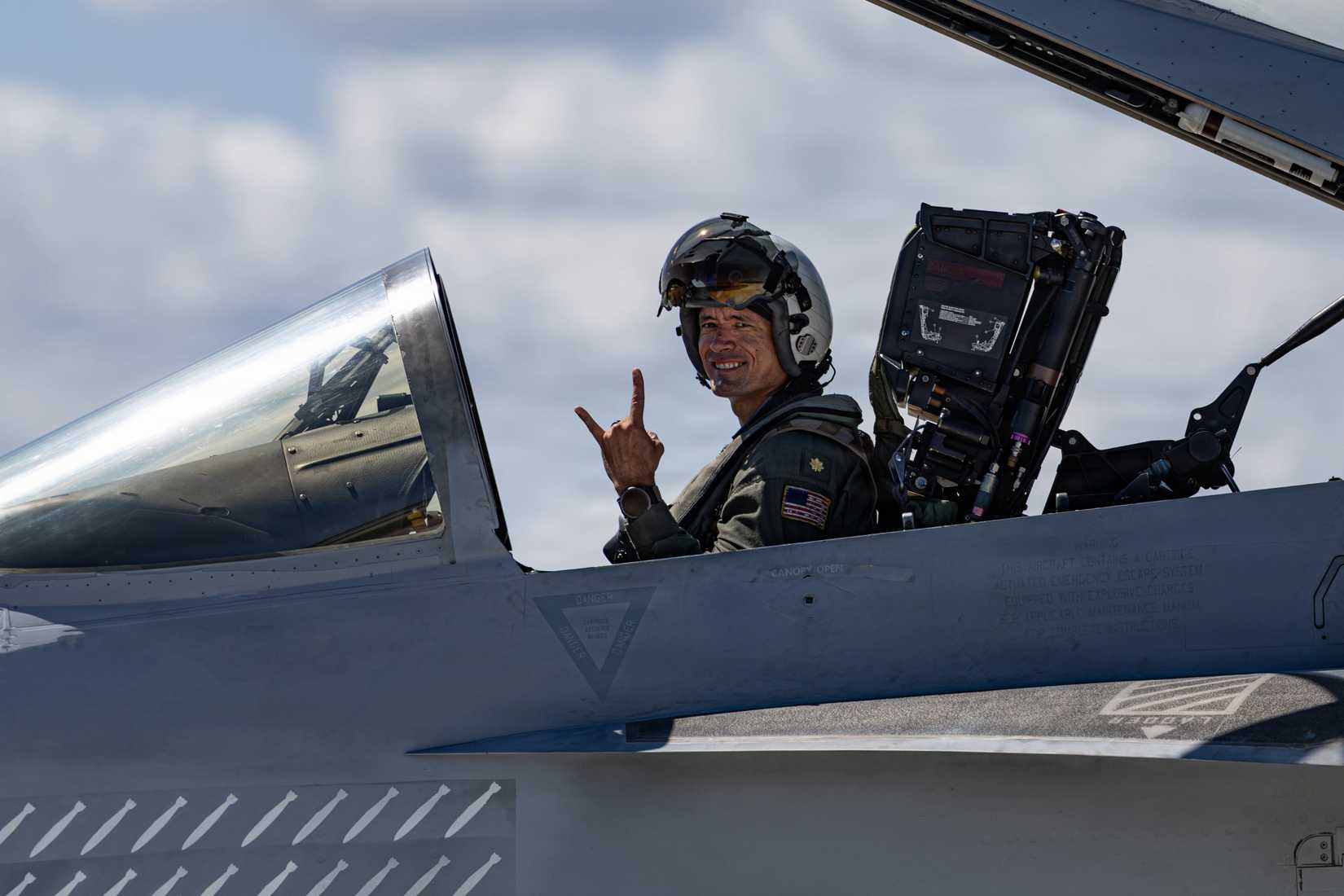 Navy pilot gestures to the camera after finishing the air power demonstration at Naval Air Station Oceana, Sept. 16, 2026.