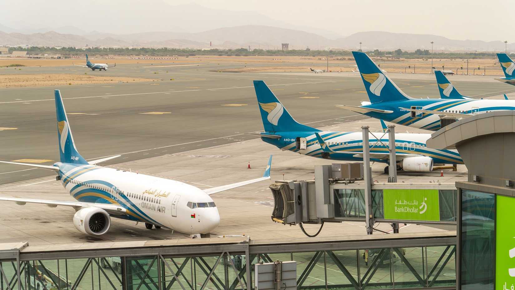 oman air planes at muscat international airport