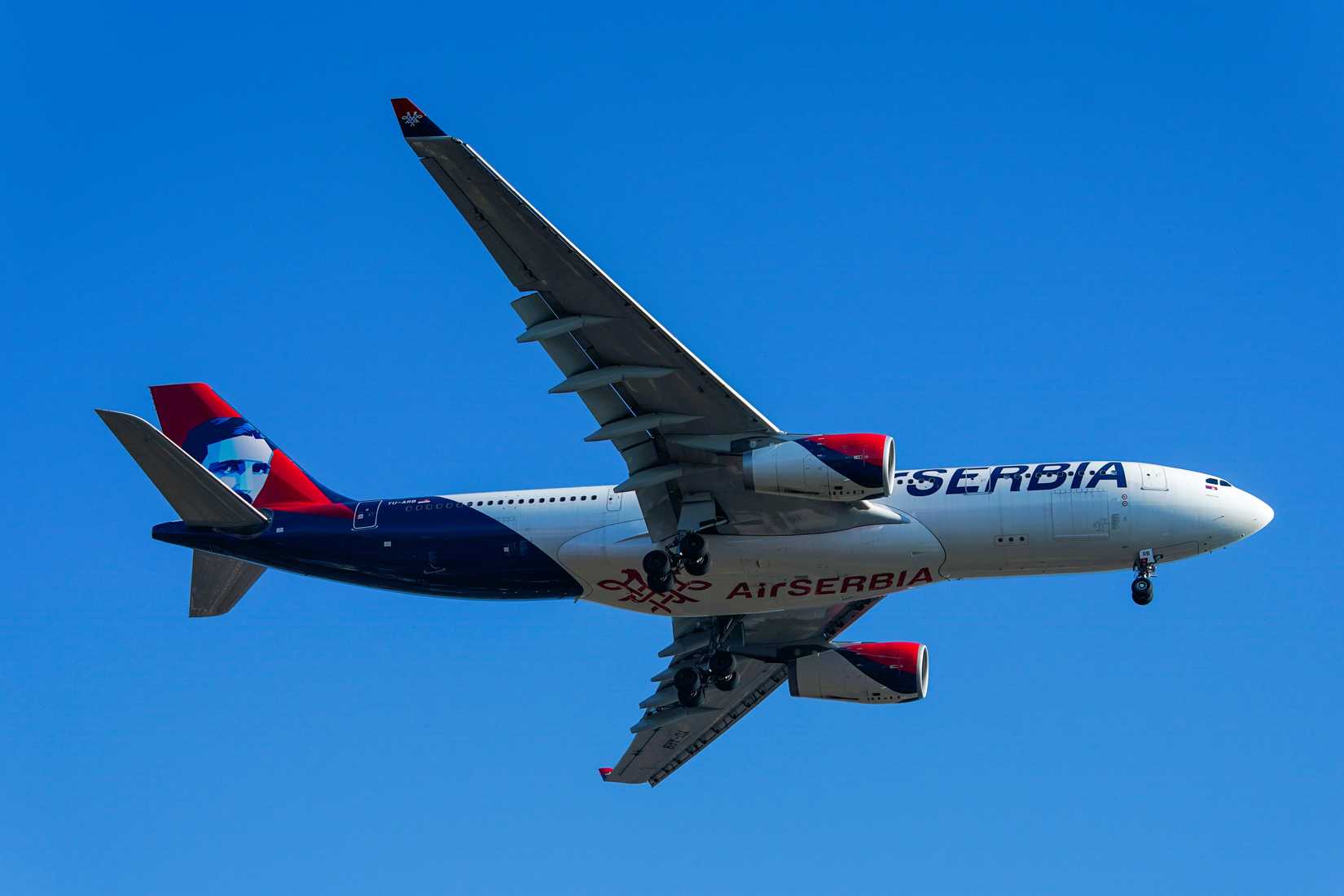 Air Serbia A330-200 flying overhead