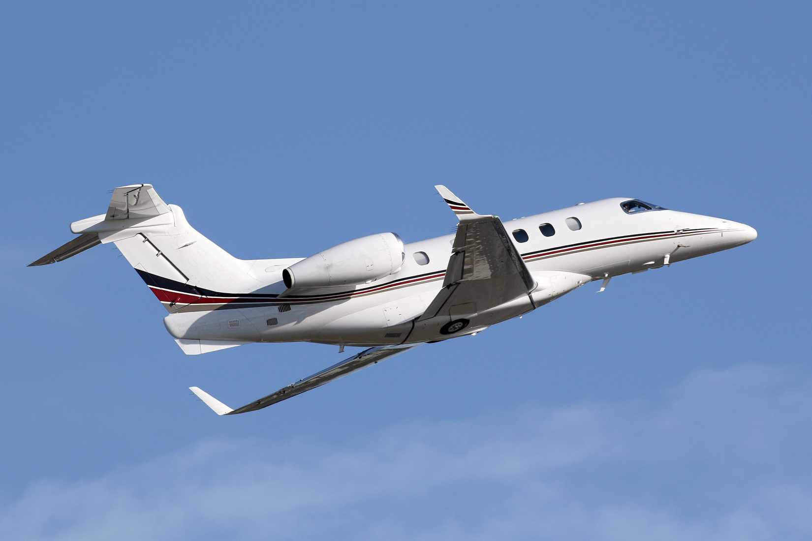 NetJets Embraer Phenom 300 Private Jet Taking Off