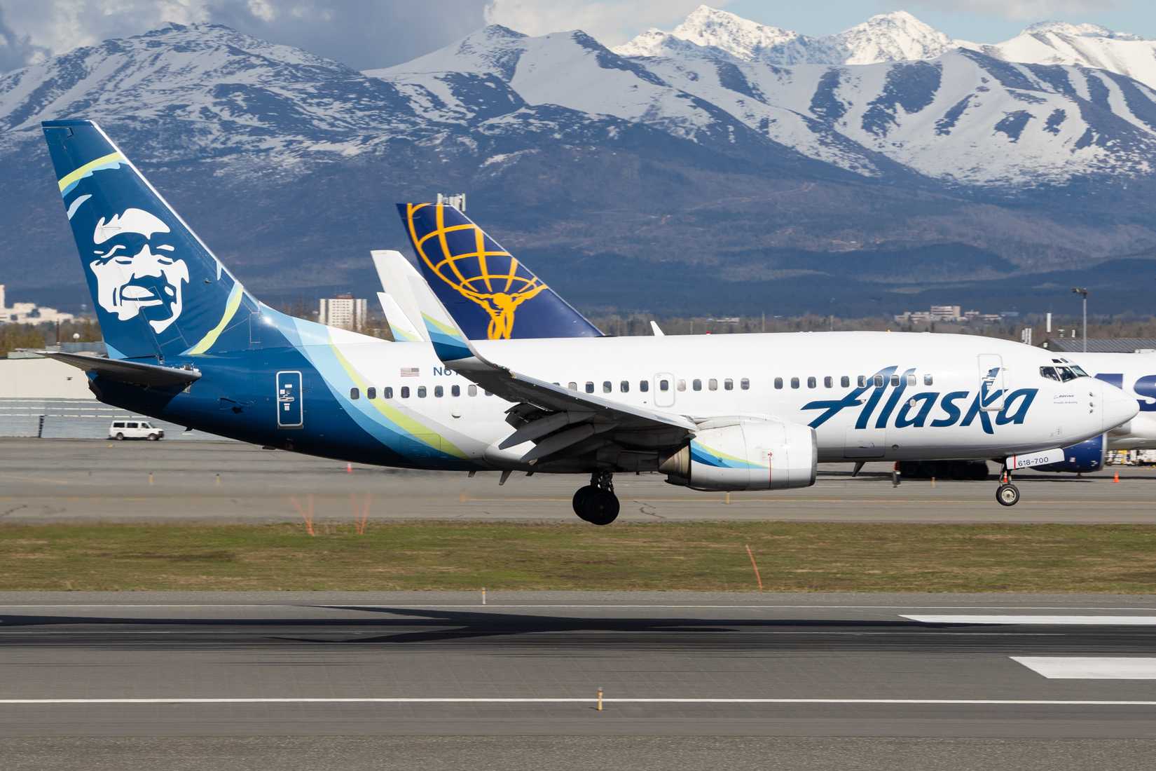 Anchorage, Alaska - May 12 2024: Alaskan Airlines Boeing 737-700 landing into PANC Airport. 