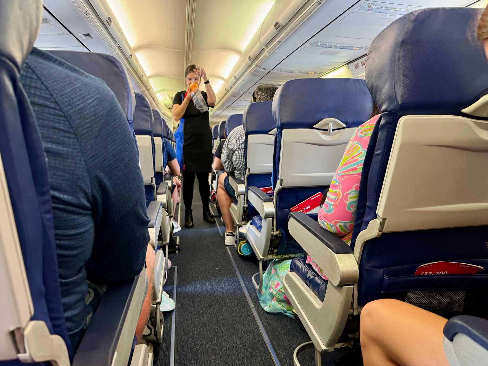 Orlando, FL USA - June 22, 2024: People on a Southwest Airlines airplane waiting for it to take off.
