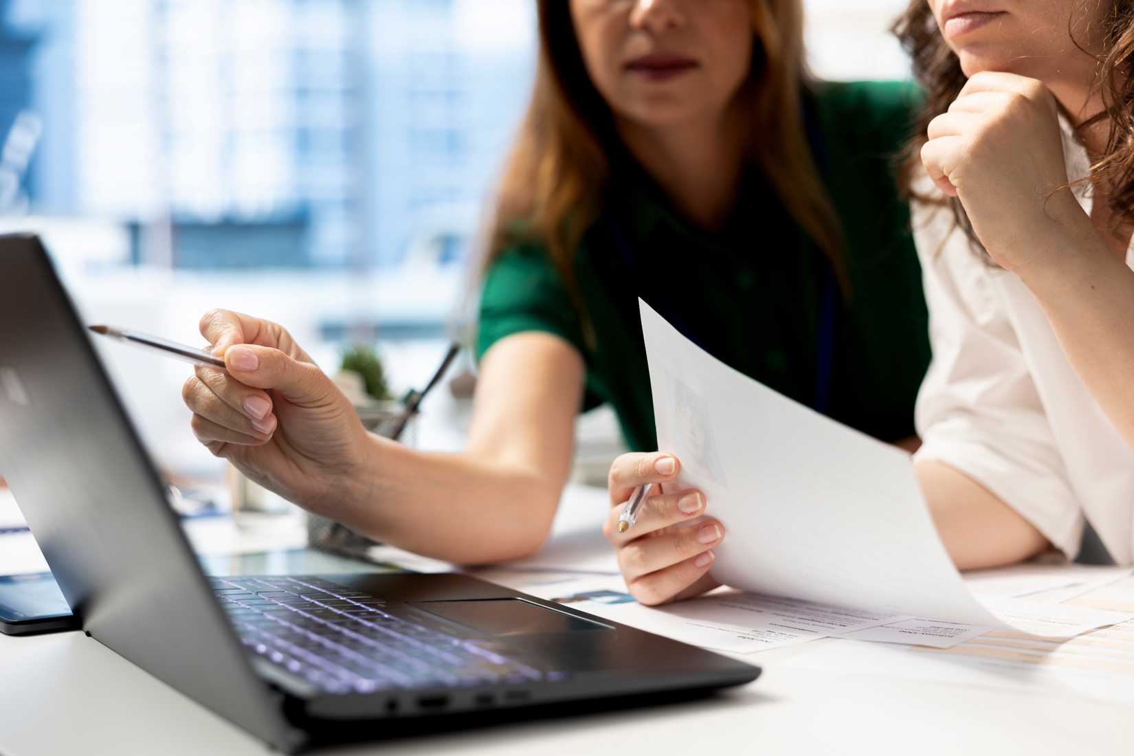 Women Looking At Laptop