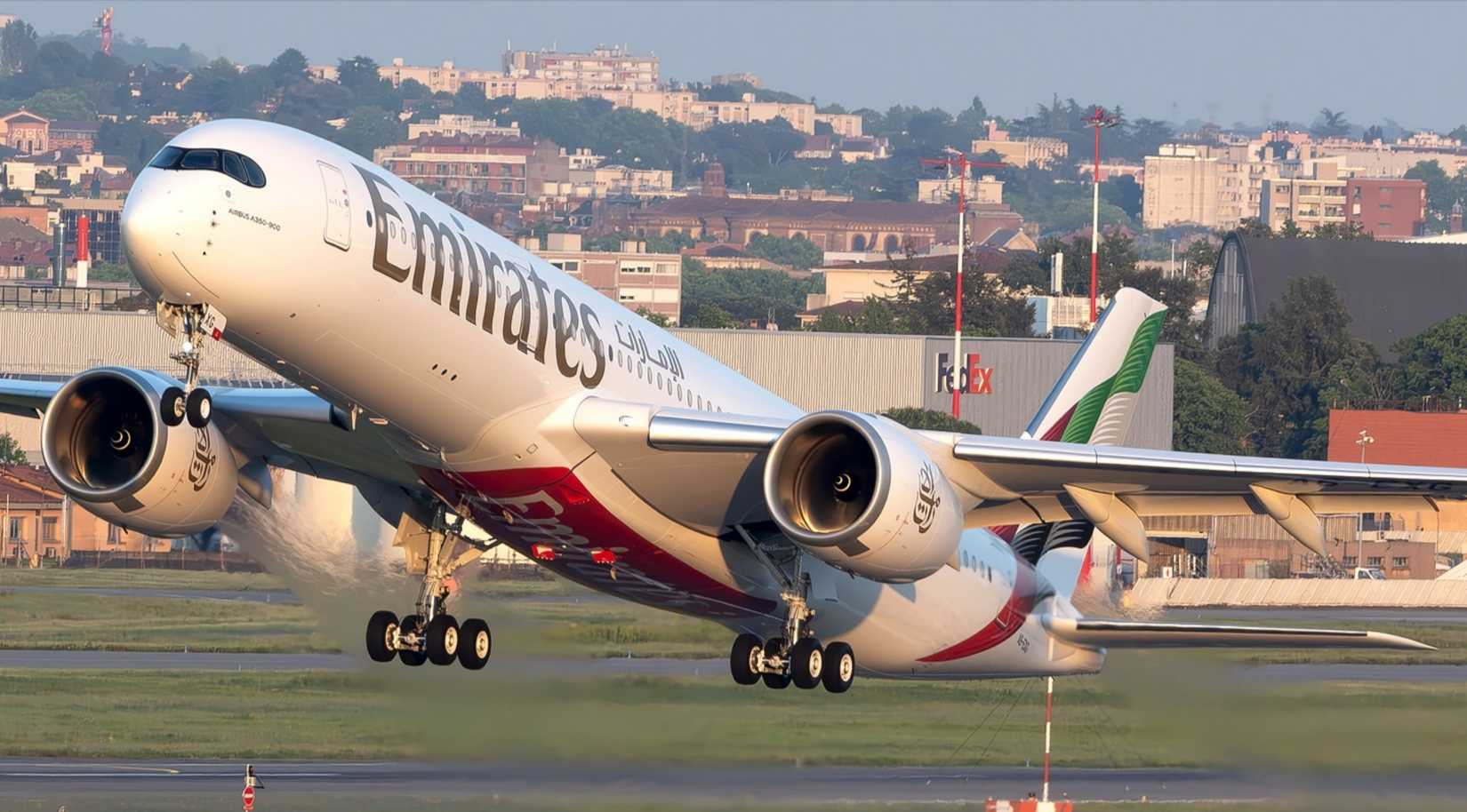 Close of Emirates Airbus A350-900 taking off from Toulouse Blagnac Airport