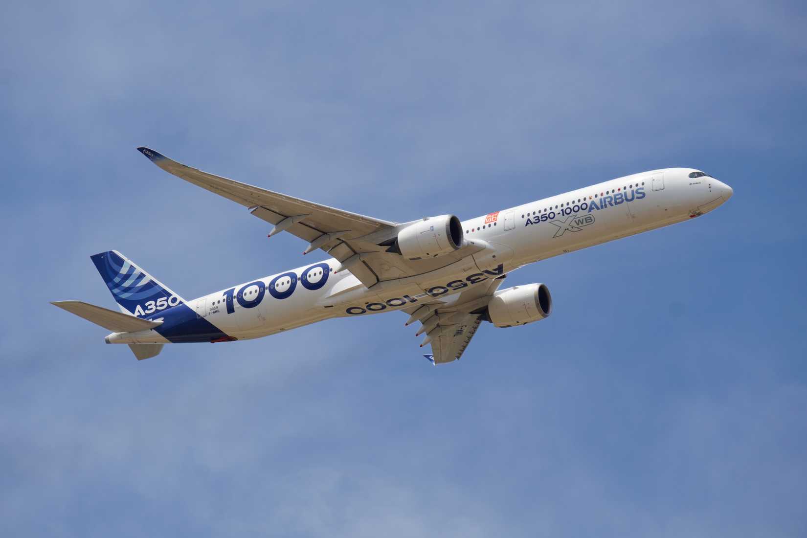 Le Bourget, France - June 20, 2025 - A350-1000 XWB (extra wide-body) from the French-European aerospace manufacturer Airbus, flying for a live demo at SIAE 2025 Paris International Air and Space Show