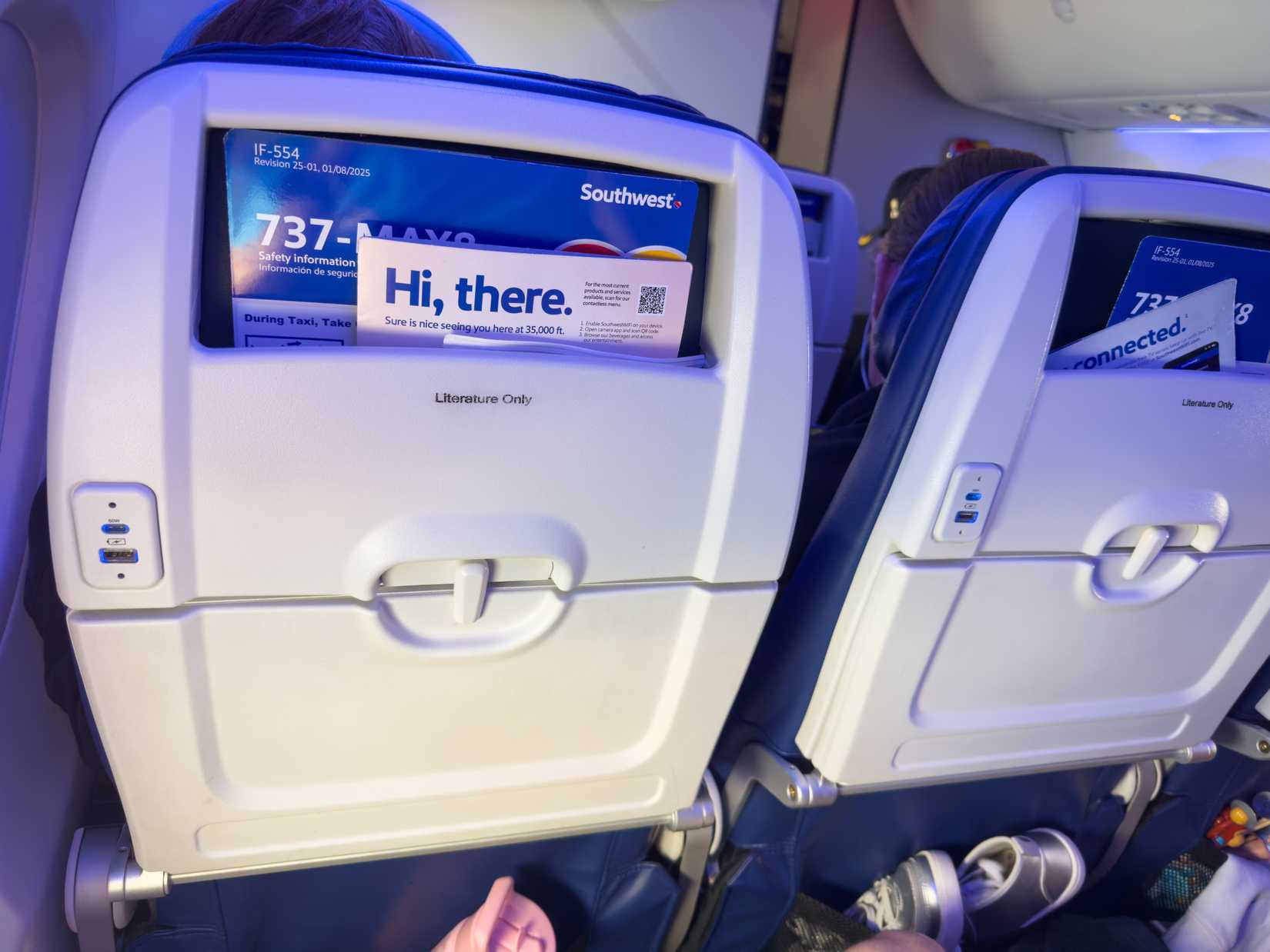 Charlotte, NC - June 15, 2025: Southwest Airlines Airplane Seatbacks with Safety Card and In-Flight Magazine.