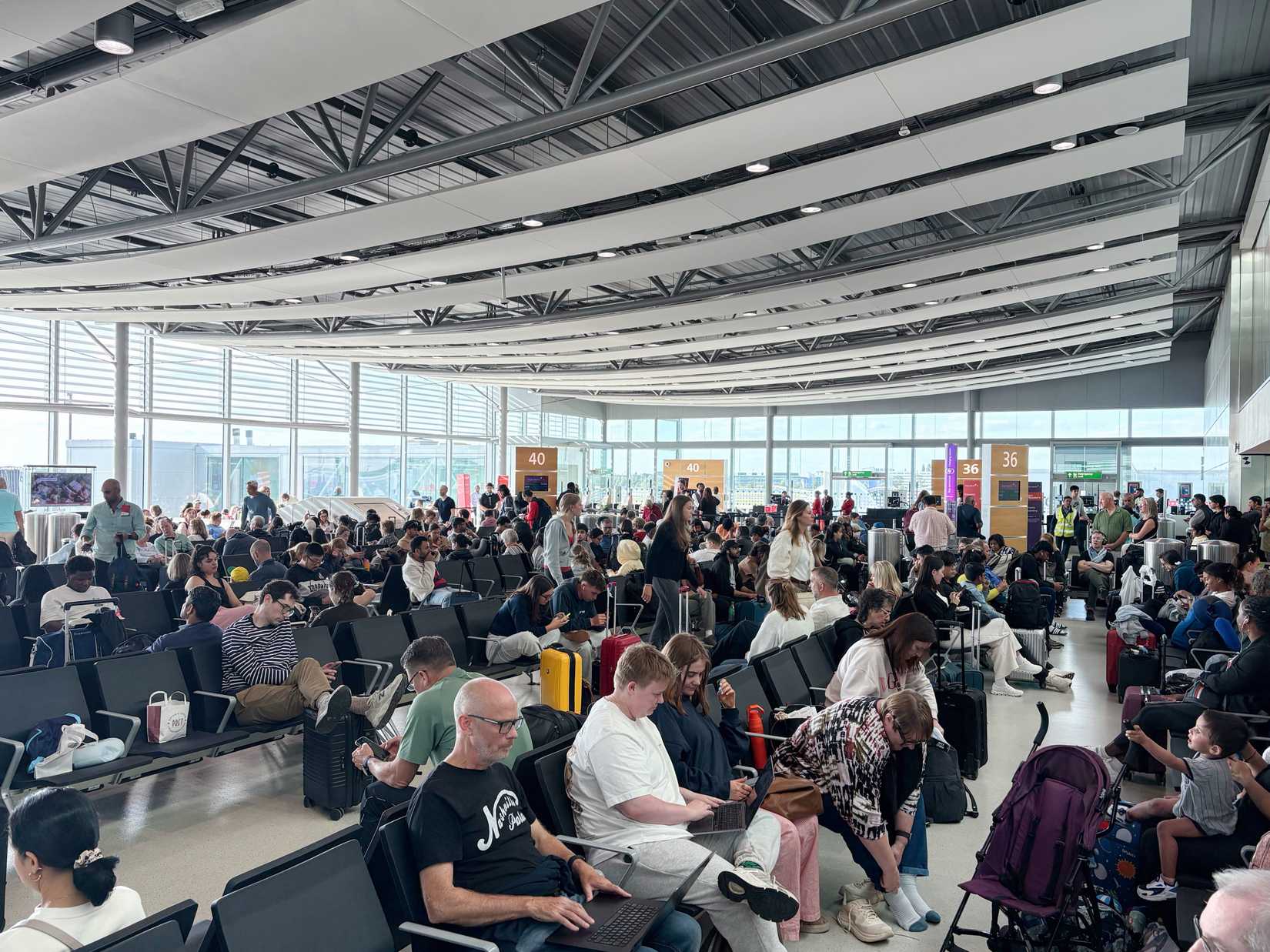 August 1, 2025: Passengers wait for a delayed plane at Heathrow Airport in the United Kingdom capital city of London.
