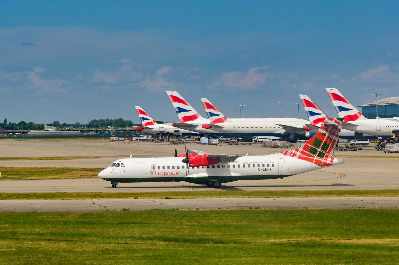 Loganair and British Airways Jets at London Heathrow (LHR)