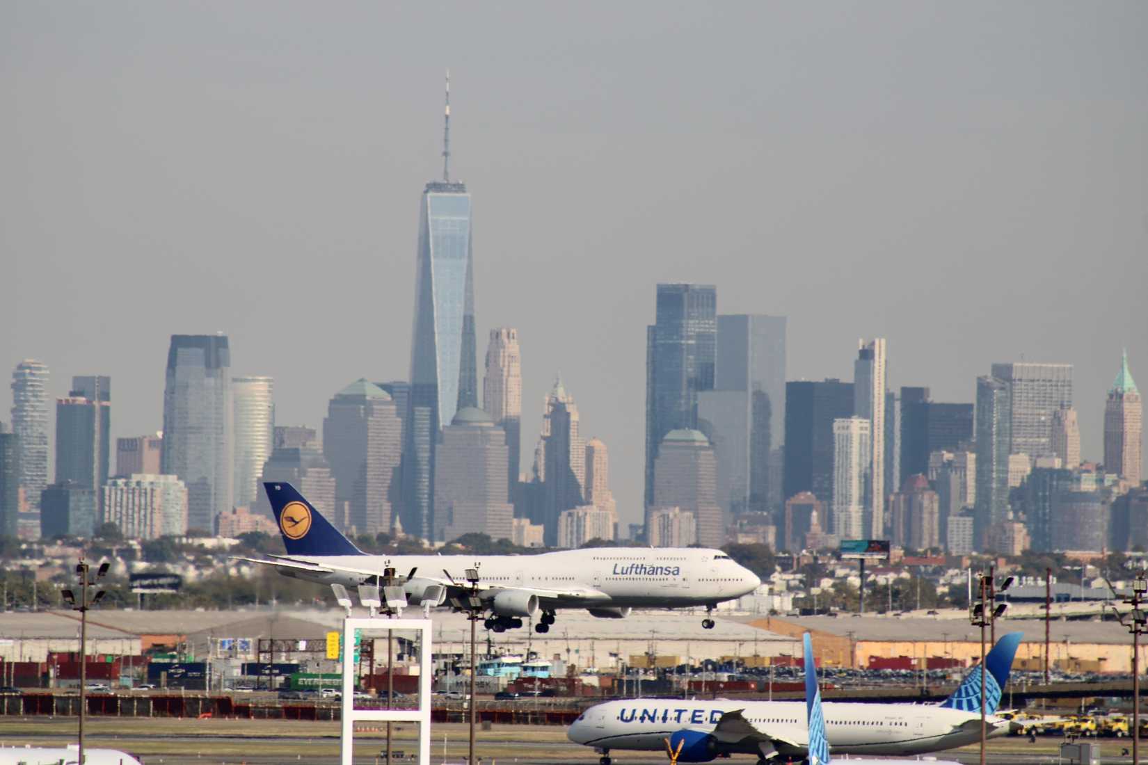 New York, USA - 25th July, 2024: Lufthansa Boeing 747-8 is arriving Newark Liberty International Airport from Munich and Frankfurt Germany with Manhattan New York City skyline on background.