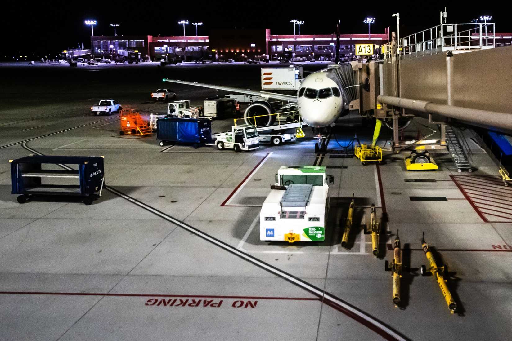 Delta A220 Parked At Night