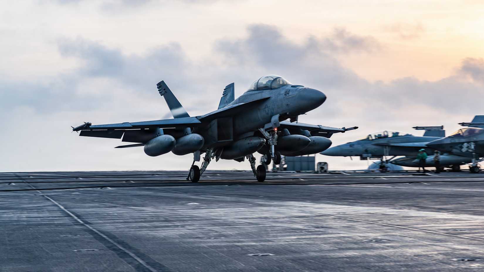 Super Hornet, attached to Strike Fighter Squadron (VFA) 195, lands