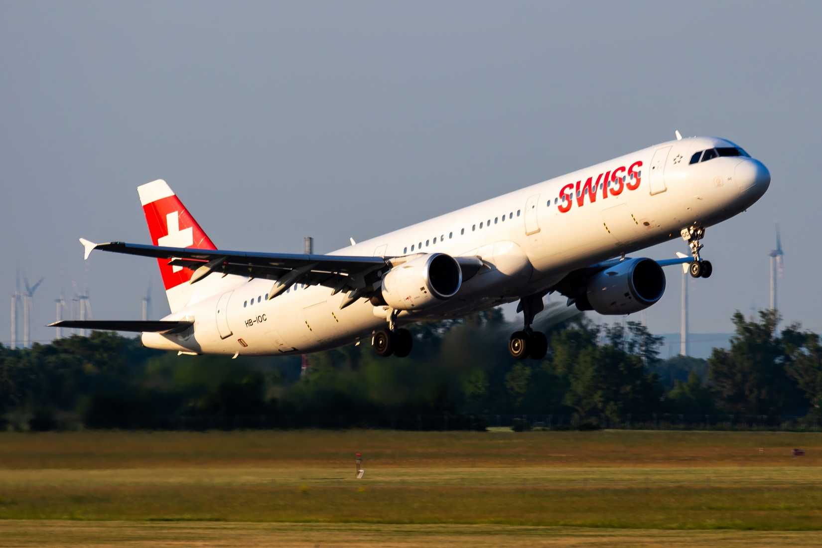 Swiss International Airlines Airbus A321 HB-IOC passenger plane departure and take off at Vienna Airport