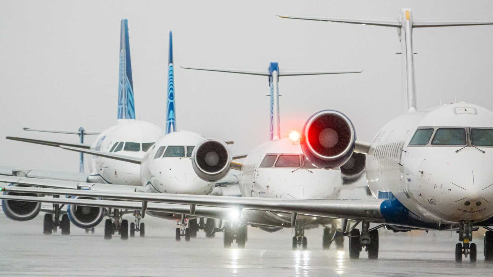 United Airlines planes lined up to take off at Denver International