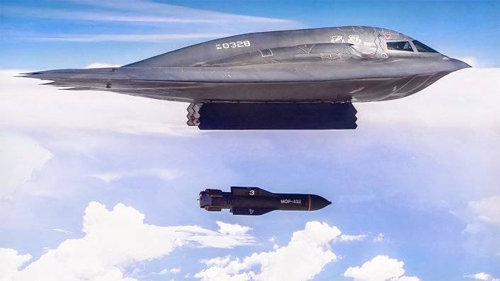A photo of a high-flying B-2 deploying a GBU-57, 30,000 lb. Massive Ordnance Penetrator.
