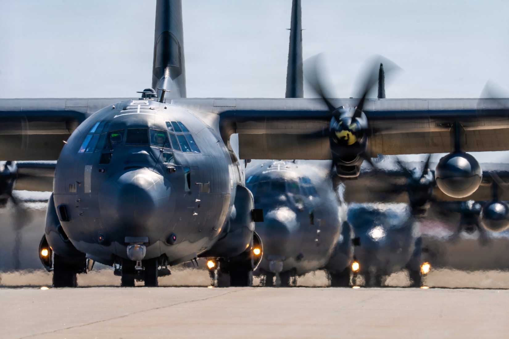 A close-up photo of several C-130s prepping to takeoff.
