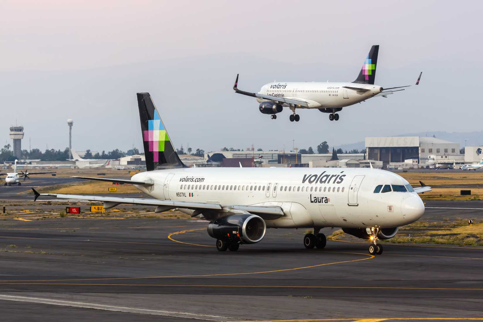 Volaris Airbus A320 airplanes at Mexico City airport (MEX) in Mexico.