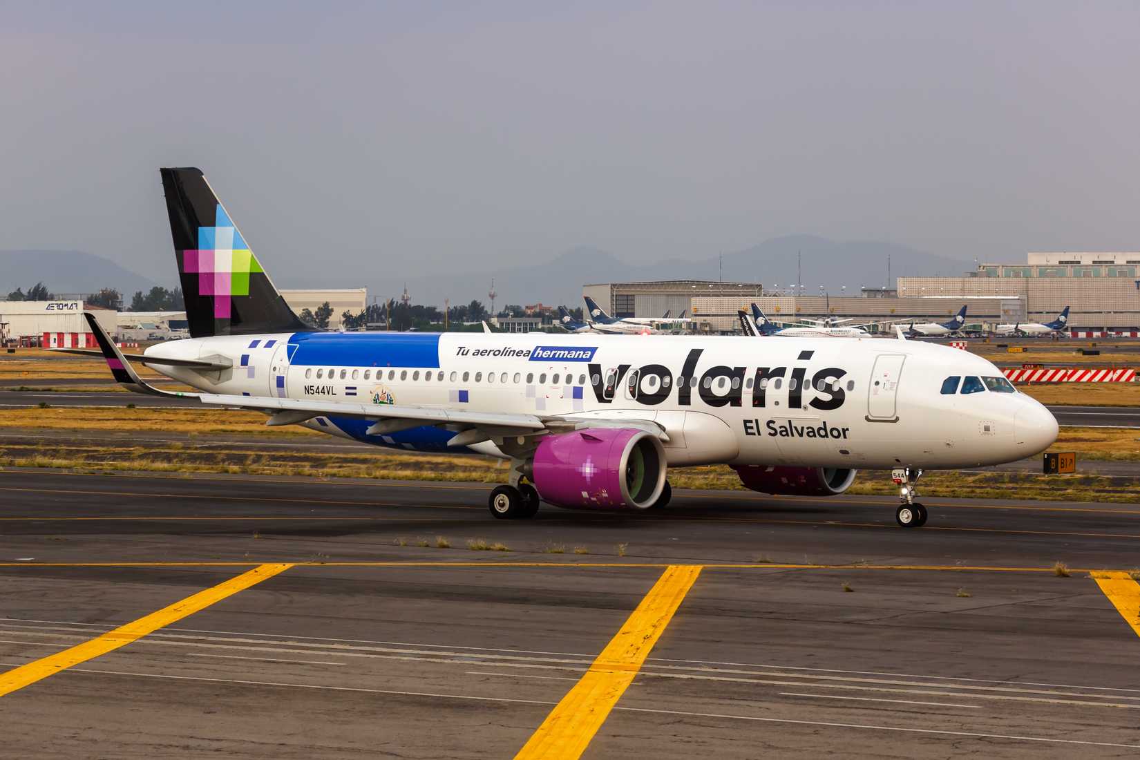 Volaris El Salvador Airbus A320neo airplane at Mexico City airport (MEX) in Mexico.