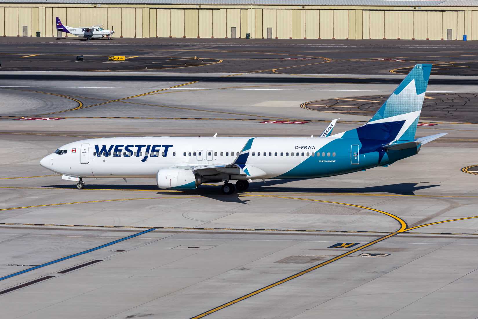 WestJet Airlines Boeing 737-800 taxi new livery